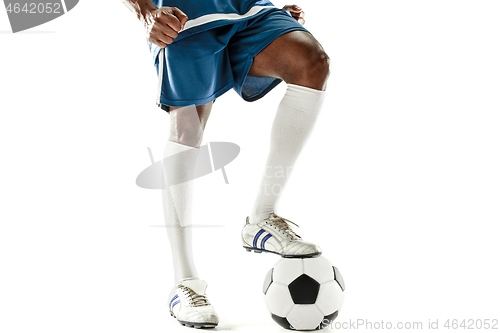 Image of legs of soccer player close-up isolated on white