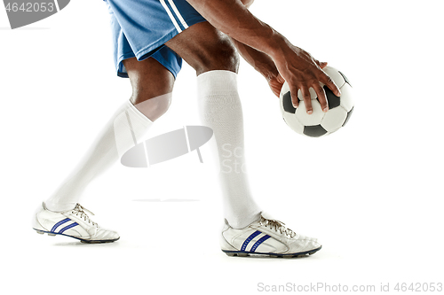 Image of legs of soccer player close-up isolated on white