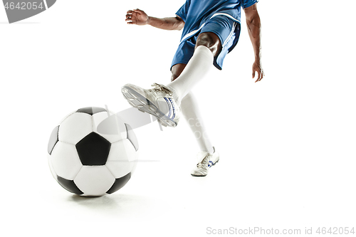 Image of legs of soccer player close-up isolated on white