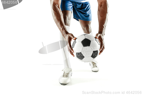 Image of legs of soccer player close-up isolated on white