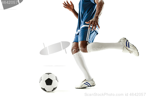 Image of legs of soccer player close-up isolated on white