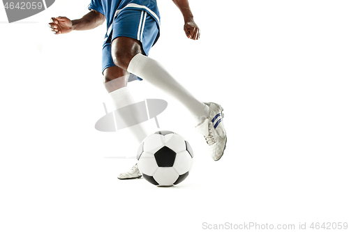 Image of legs of soccer player close-up isolated on white