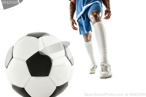 Image of legs of soccer player close-up isolated on white