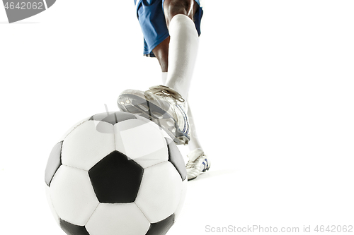 Image of legs of soccer player close-up isolated on white