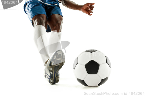 Image of legs of soccer player close-up isolated on white