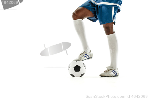 Image of legs of soccer player close-up isolated on white