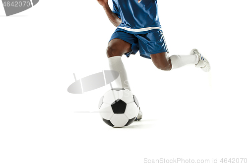 Image of legs of soccer player close-up isolated on white