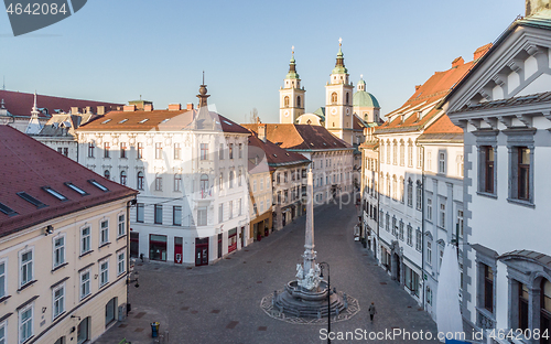 Image of Panoramic aerial view of Town Square in Ljubljana, capital of Slovenia, at sunset. Empty streets of Slovenian capital during corona virus pandemic social distancing measures in 2020