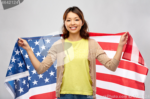 Image of happy asian woman with american flag
