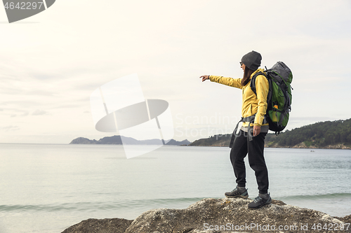 Image of Woman pointing to the view