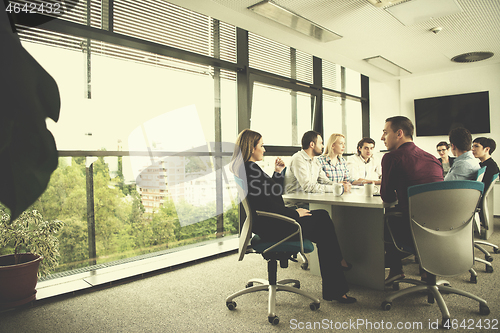Image of Group of young people meeting in startup office