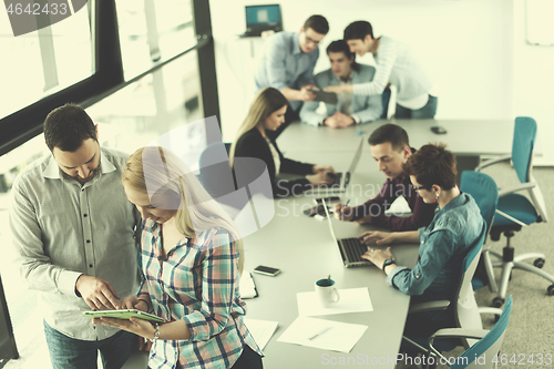 Image of business People Working With Tablet in office