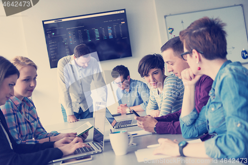 Image of Group of young people meeting in startup office