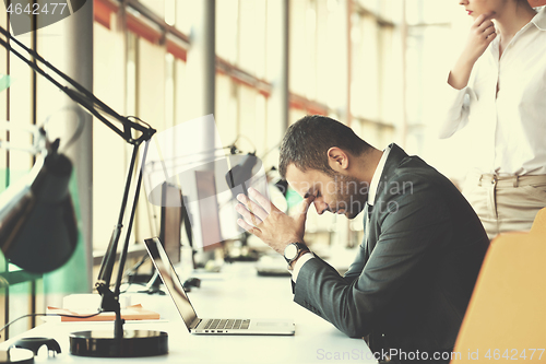 Image of frustrated young business man