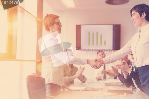 Image of business womans handshake