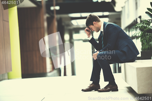 Image of frustrated young business man