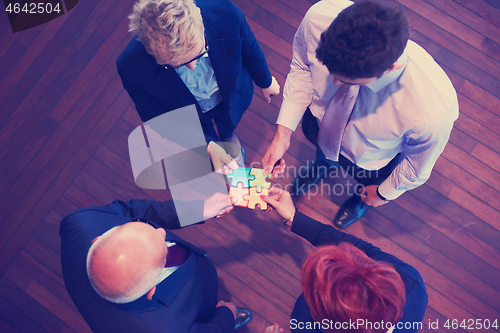 Image of assembling jigsaw puzzle