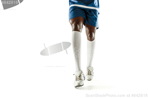 Image of legs of soccer player close-up isolated on white