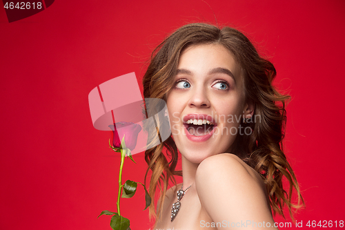 Image of Beautiful young girl in studio with pearl jewelry - earrings, bracelet, necklace.