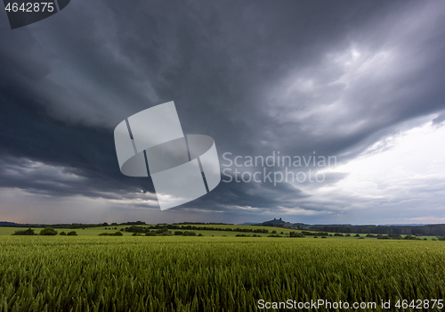 Image of Storm clouds over Trosky Castle, Czech Republic