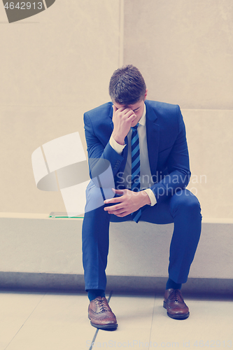 Image of frustrated young business man