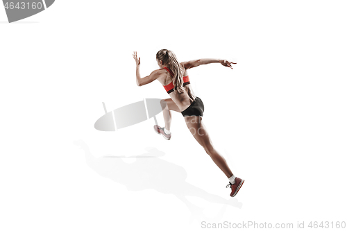 Image of one caucasian woman running on white background