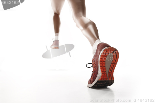 Image of one caucasian woman running on white background