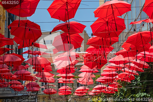 Image of Red Umbrellas Hanging