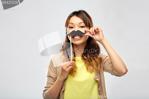 Image of happy asian woman with big black mustache