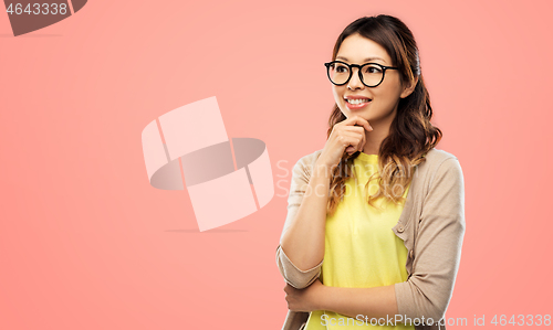 Image of happy asian woman in glasses or student