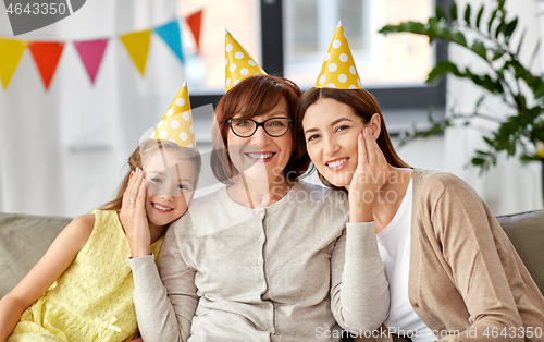 Image of mother, daughter and grandmother at birthday party