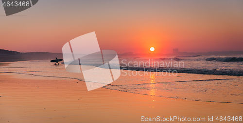 Image of Surfer on the beach