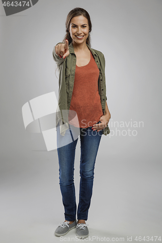 Image of Beautiful woman pointing 