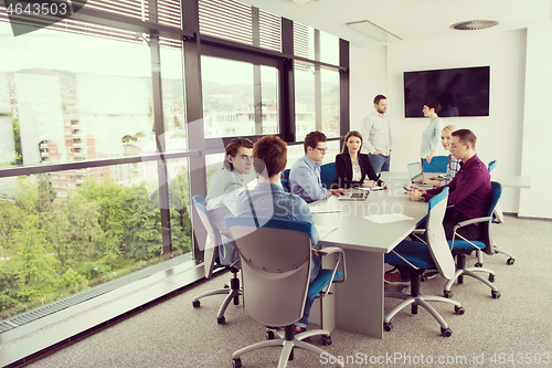 Image of Business Team At A Meeting at modern office building