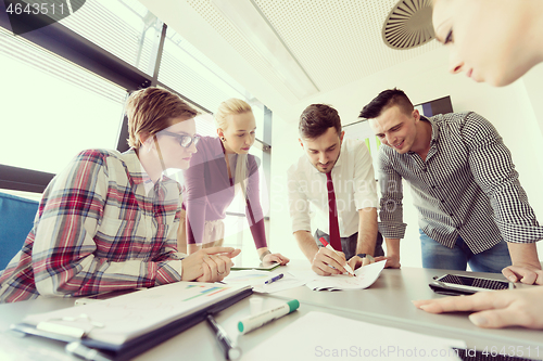 Image of startup business team on meeting at modern office