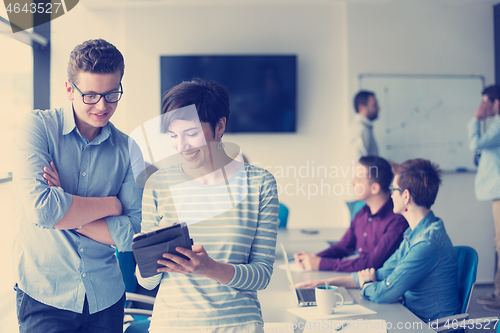 Image of business People Working With Tablet in office