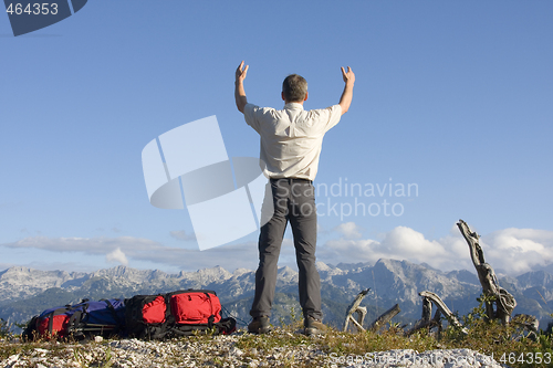 Image of Man on top of mountain