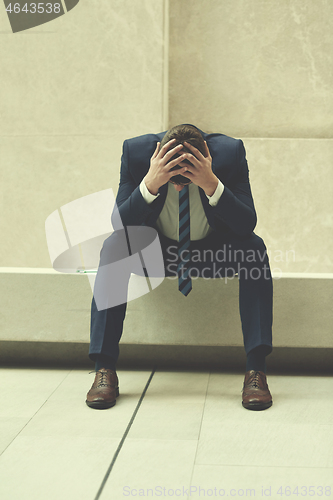 Image of frustrated young business man