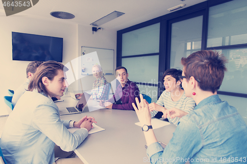 Image of Business Team At A Meeting at modern office building