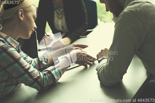 Image of Business Team At A Meeting at modern office building