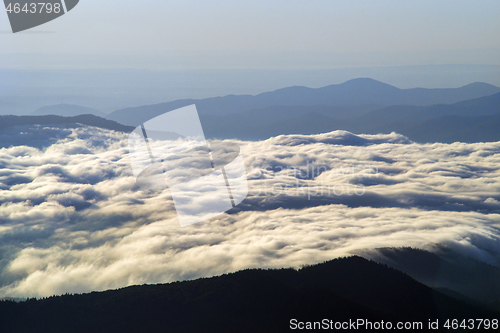 Image of Clouds covering the river valley at sunrise