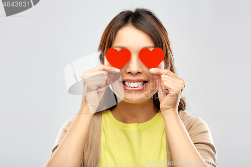 Image of happy woman with eyes of hearts