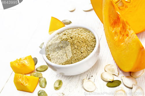 Image of Flour pumpkin in white bowl on board