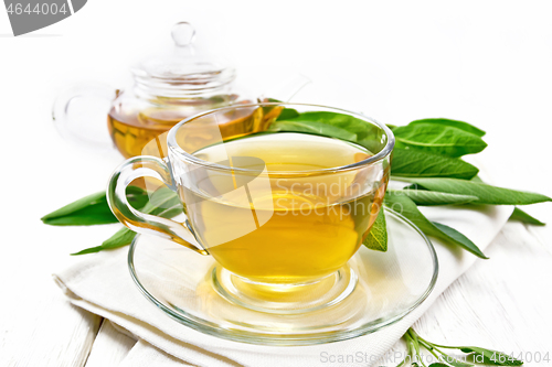 Image of Tea herbal with sage in cup on board