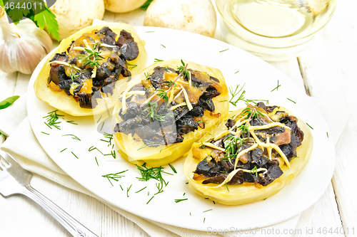 Image of Potatoes stuffed with mushrooms on napkin