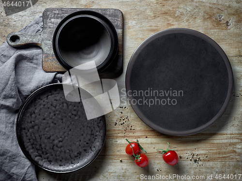 Image of various empty dark plates