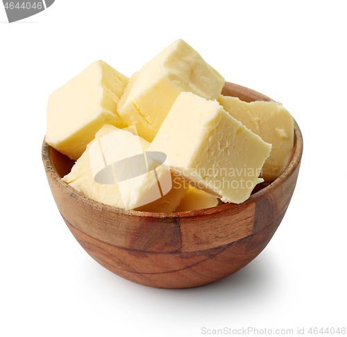 Image of butter cubes in wooden bowl