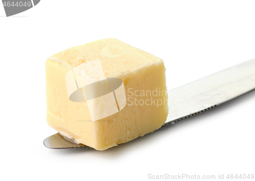 Image of butter cube on knife