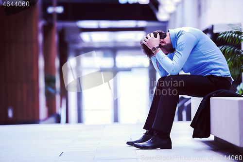 Image of frustrated young business man