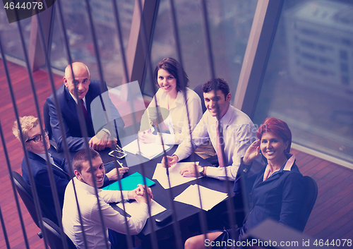 Image of business people group on meeting at modern bright office